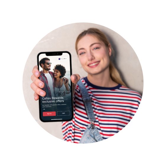 Woman showing the CaltexGO app on phone to camera