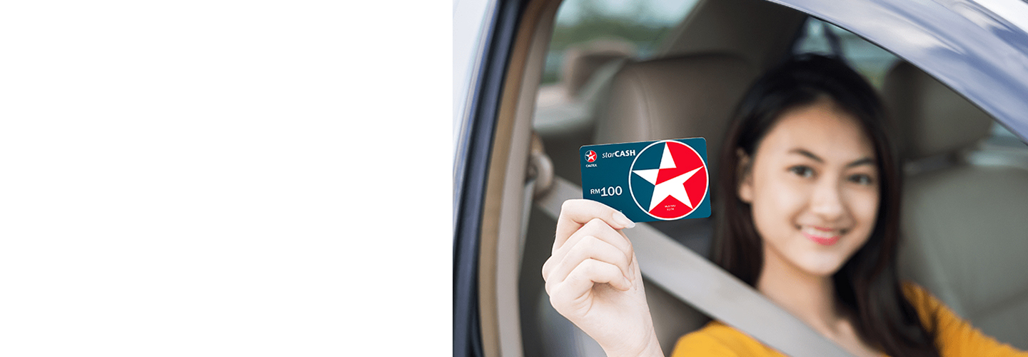 Woman holding Caltex StarCash card
