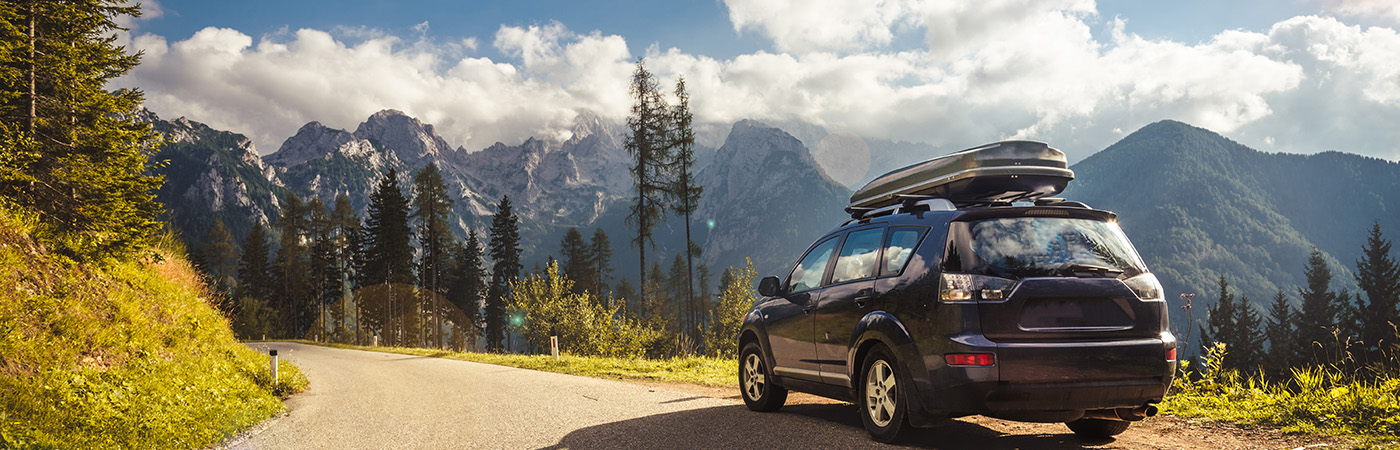 car on a long mountain road